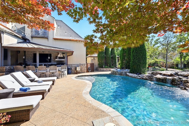 10616 S Forest Ave, Jenks, OK 74037 - view of pool with a patio area, a pool with connected hot tub, and outdoor dry bar