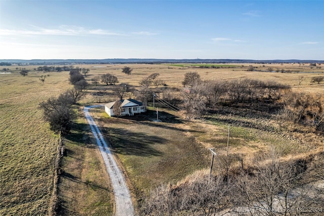 birds eye view of property featuring a rural view