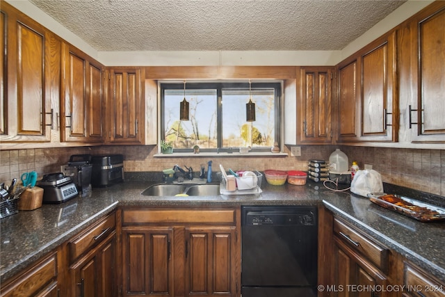 kitchen with dishwasher, a textured ceiling, tasteful backsplash, and sink