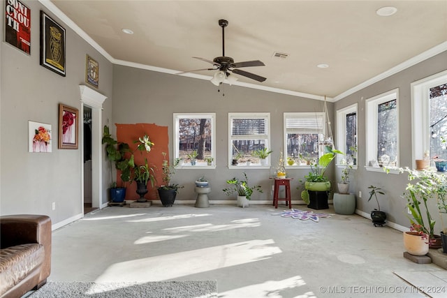 sunroom featuring ceiling fan, lofted ceiling, and a wealth of natural light