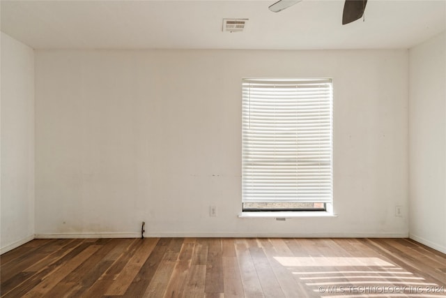 spare room featuring ceiling fan and wood-type flooring