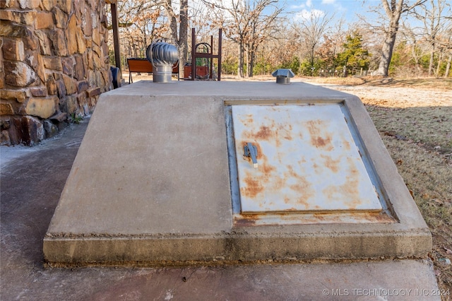 view of entry to storm shelter