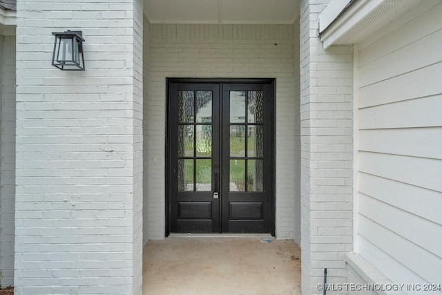 doorway to property with french doors