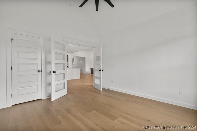 empty room featuring ceiling fan and light hardwood / wood-style floors