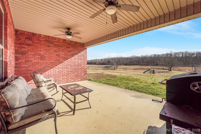 view of patio featuring ceiling fan and an outdoor hangout area