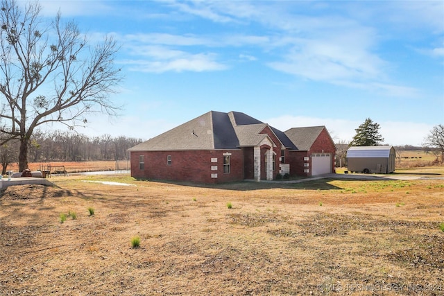 view of property exterior with a garage and a yard