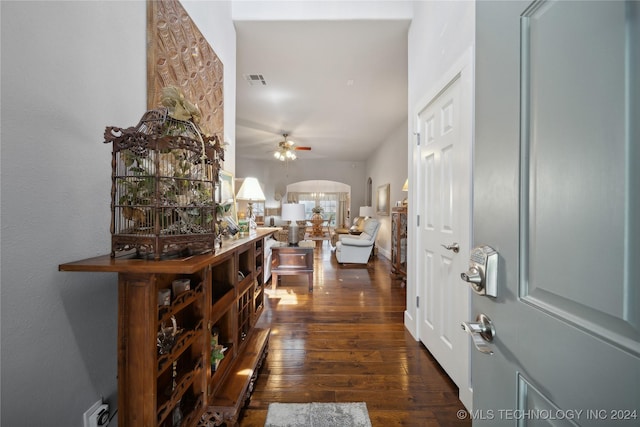 hall featuring dark wood-type flooring