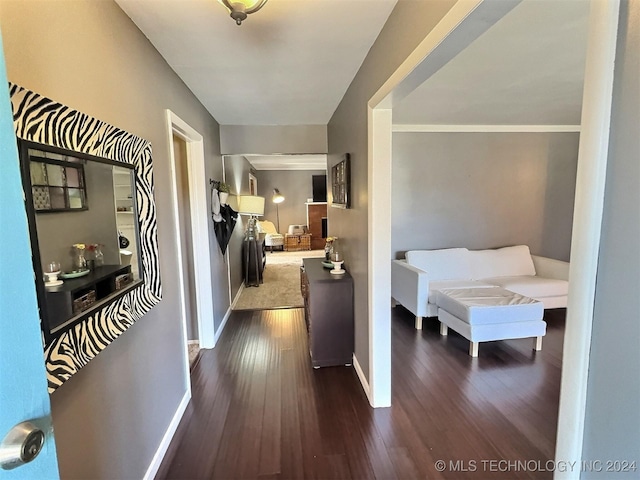 corridor featuring dark hardwood / wood-style floors