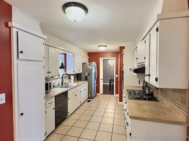 kitchen with sink, light tile patterned floors, backsplash, white cabinets, and black appliances