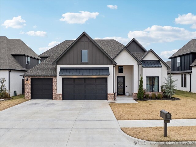 view of front of home with a garage