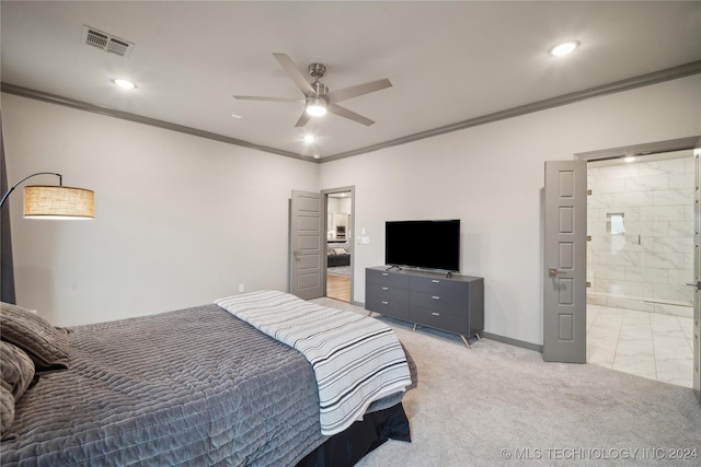 carpeted bedroom featuring ornamental molding, ceiling fan, and ensuite bath