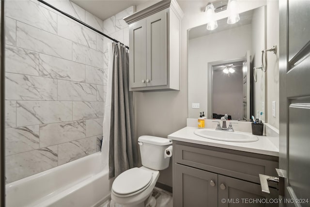 full bathroom featuring vanity, toilet, and shower / bath combo with shower curtain