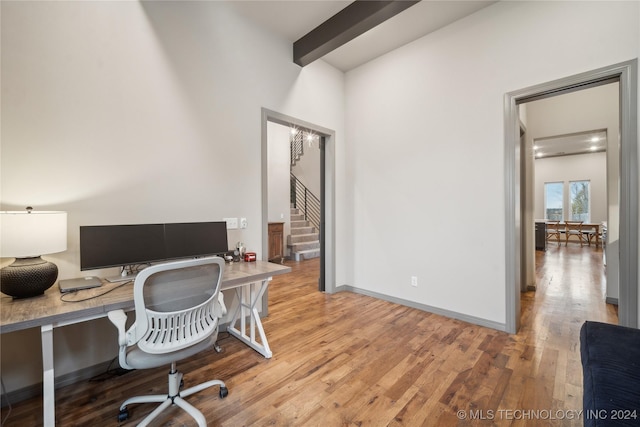 office area featuring beam ceiling and hardwood / wood-style floors