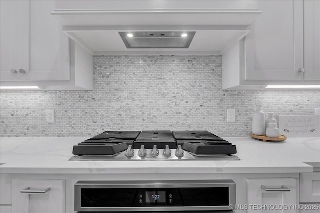 4255 S 173rd E Ave, Tulsa, OK 74134 - kitchen with stainless steel gas cooktop, white cabinetry, tasteful backsplash, and wall oven
