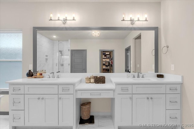 4255 S 173rd E Ave, Tulsa, OK 74134 - bathroom with marble look tile flooring, a stall shower, double vanity, and a spacious closet