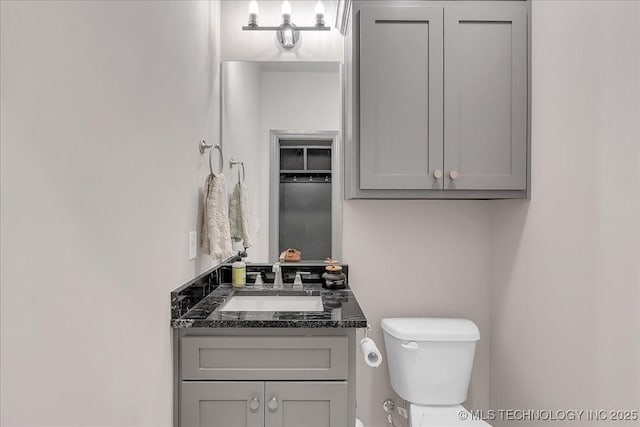 4255 S 173rd E Ave, Tulsa, OK 74134 - half bathroom featuring toilet and vanity