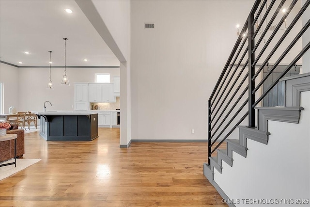 4255 S 173rd E Ave, Tulsa, OK 74134 - foyer featuring stairway, light wood-type flooring, and recessed lighting