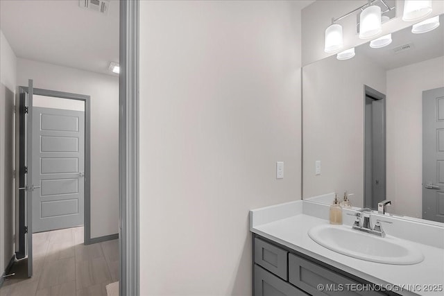 4255 S 173rd E Ave, Tulsa, OK 74134 - bathroom with vanity and baseboards