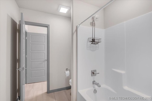 4255 S 173rd E Ave, Tulsa, OK 74134 - bathroom featuring toilet and tub / shower combination