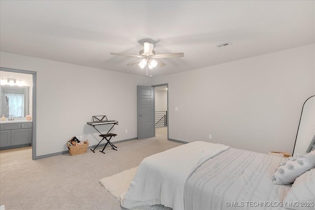 4255 S 173rd E Ave, Tulsa, OK 74134 - bedroom with light carpet, ceiling fan, and ensuite bathroom