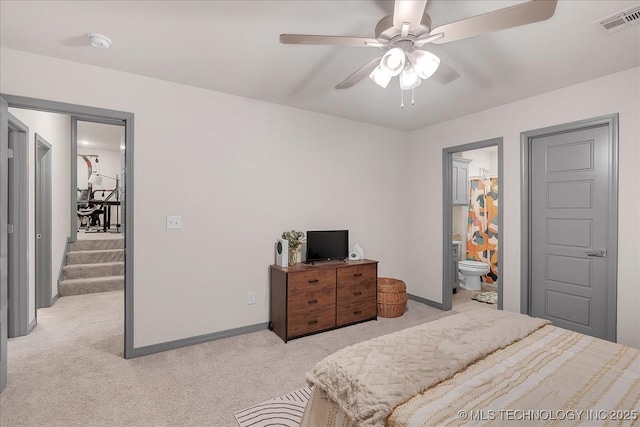 4255 S 173rd E Ave, Tulsa, OK 74134 - bedroom with light carpet, ceiling fan, and connected bathroom