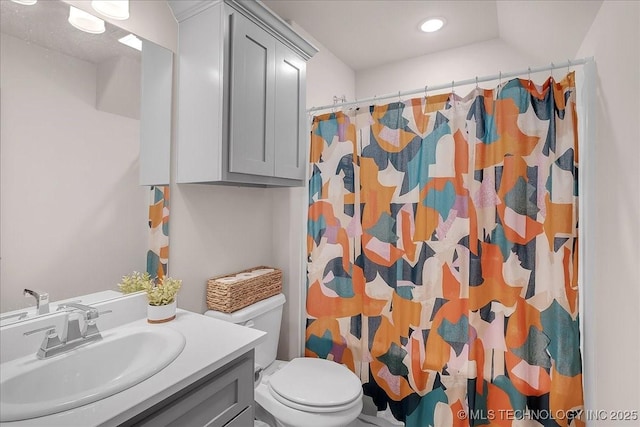 4255 S 173rd E Ave, Tulsa, OK 74134 - bathroom featuring vanity, curtained shower, and recessed lighting