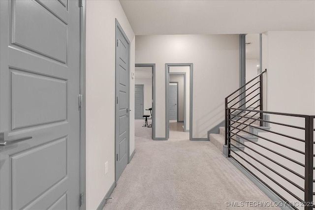 4255 S 173rd E Ave, Tulsa, OK 74134 - hallway with light colored carpet and stairway