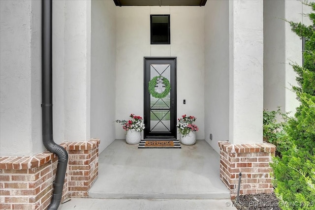 4255 S 173rd E Ave, Tulsa, OK 74134 - view of exterior entry with stucco siding