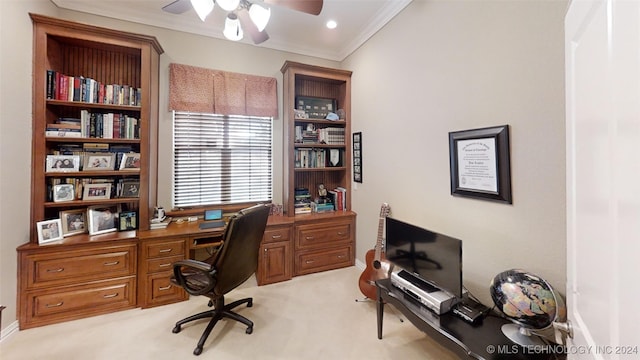 carpeted office featuring ceiling fan and ornamental molding