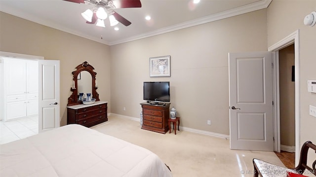 bedroom with ceiling fan, a closet, light carpet, and ornamental molding