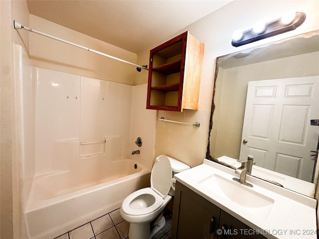 full bathroom with toilet, vanity, tile patterned floors, and shower / bathtub combination