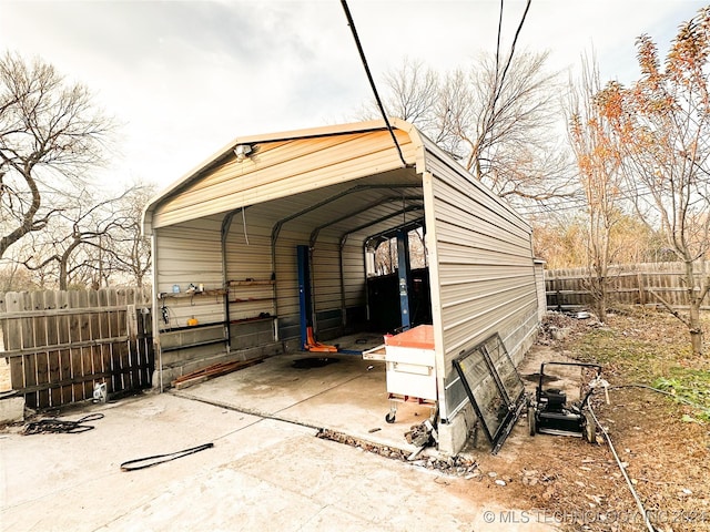 view of outdoor structure with a carport