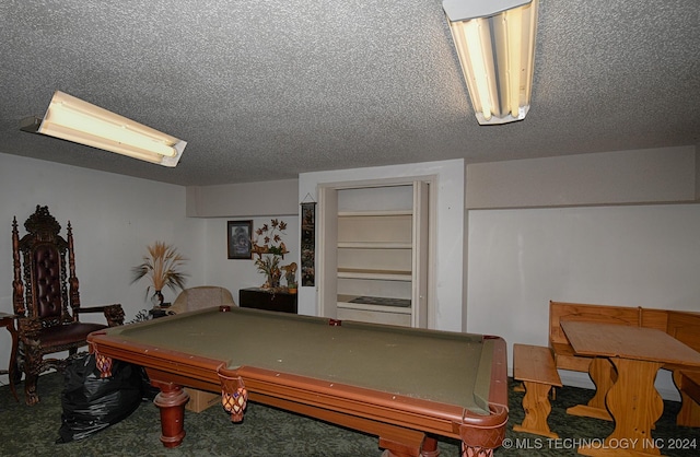 recreation room featuring carpet floors, a textured ceiling, and billiards