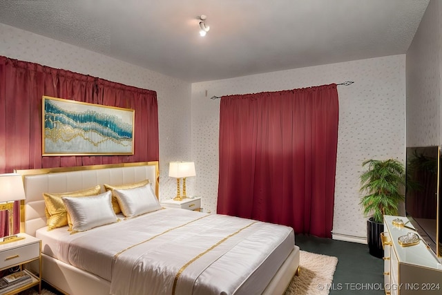 bedroom with a textured ceiling