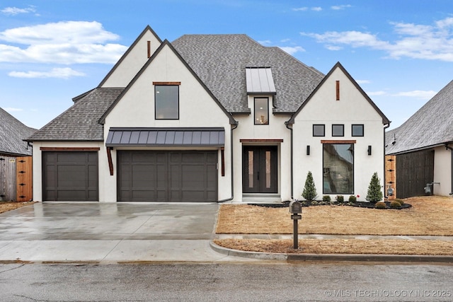 view of front of property with a garage