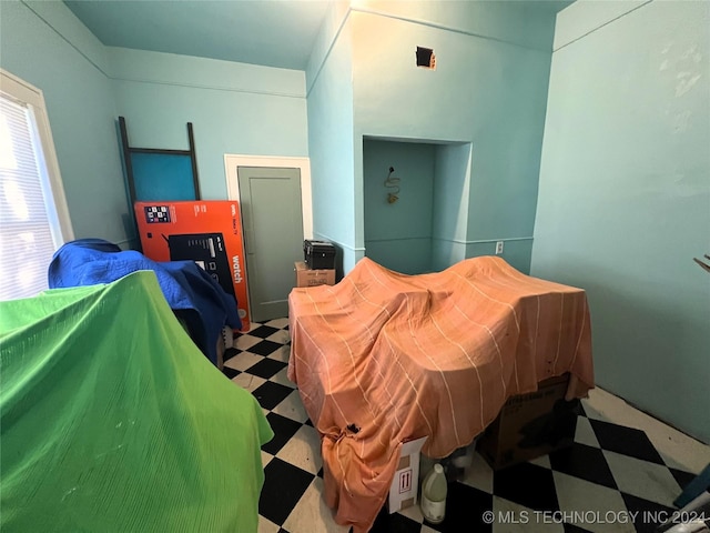 bedroom with tile patterned floors