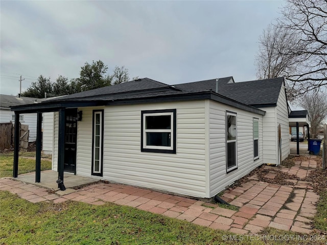 back of property with a patio area