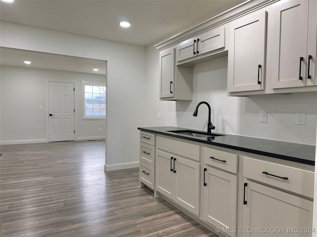 kitchen featuring dark hardwood / wood-style floors and sink