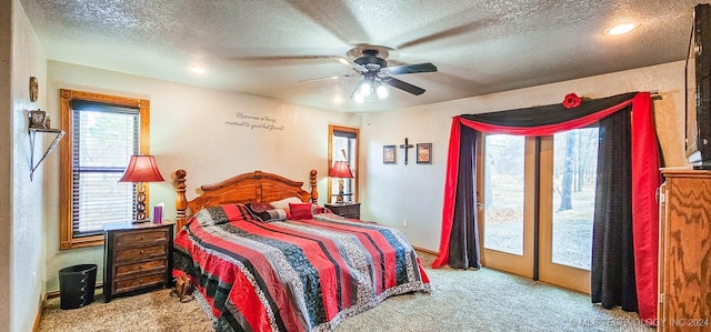 bedroom featuring access to outside, ceiling fan, light carpet, and a textured ceiling