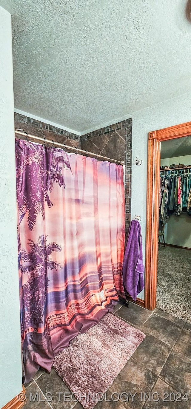 bathroom with a textured ceiling