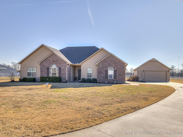 view of front facade with a front lawn and a garage