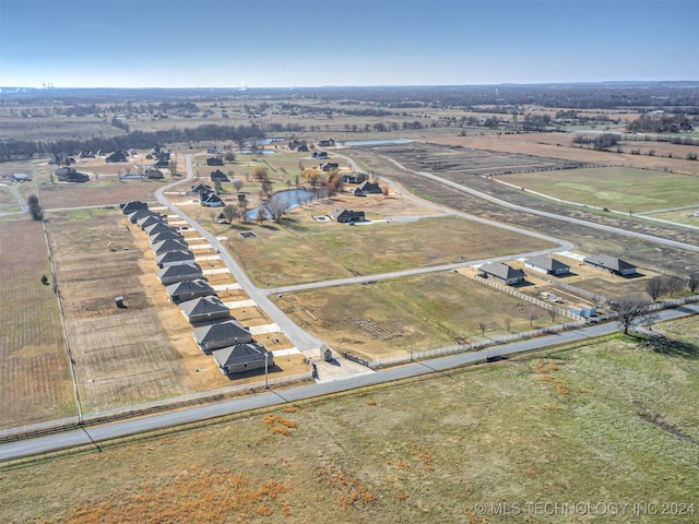 birds eye view of property featuring a rural view