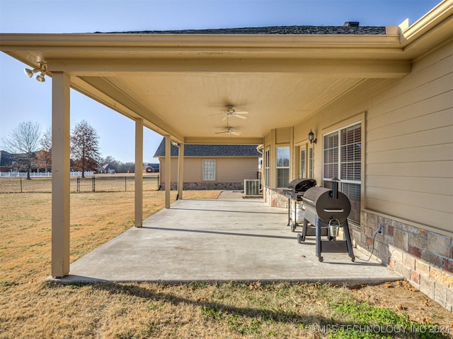 view of patio / terrace with ceiling fan and a grill