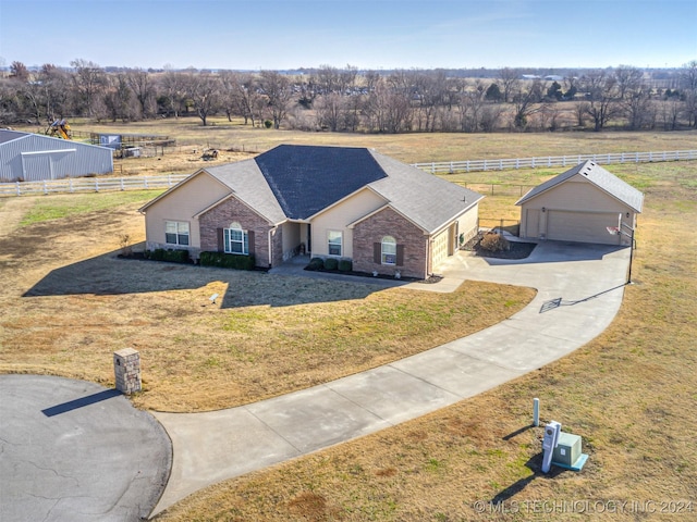 birds eye view of property featuring a rural view