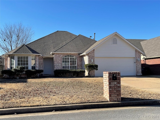 single story home with a garage