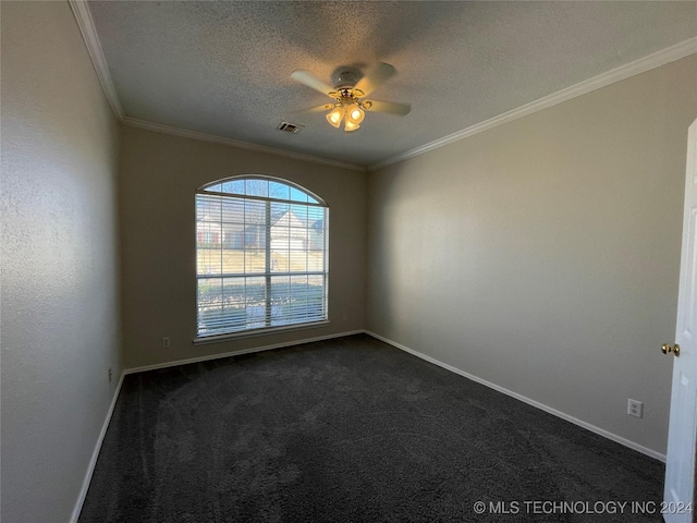 carpeted empty room featuring a textured ceiling, ceiling fan, and crown molding