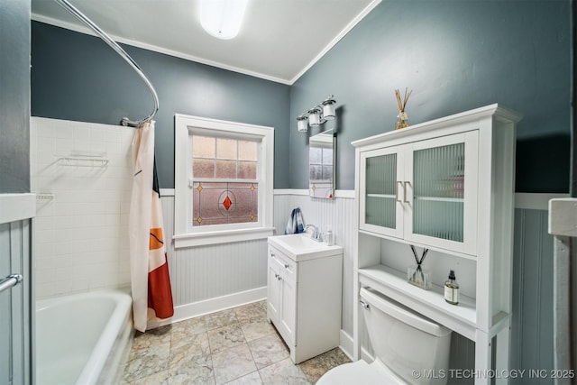 full bathroom with vanity, crown molding, toilet, and shower / bath combo