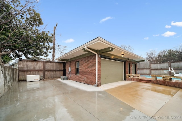 view of side of home with a patio