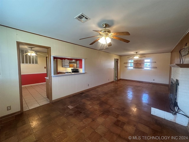 unfurnished living room with a fireplace