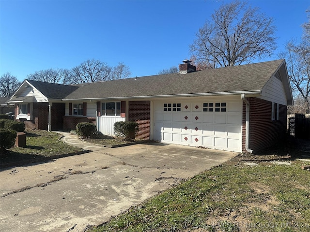 view of front of home featuring a porch and a garage